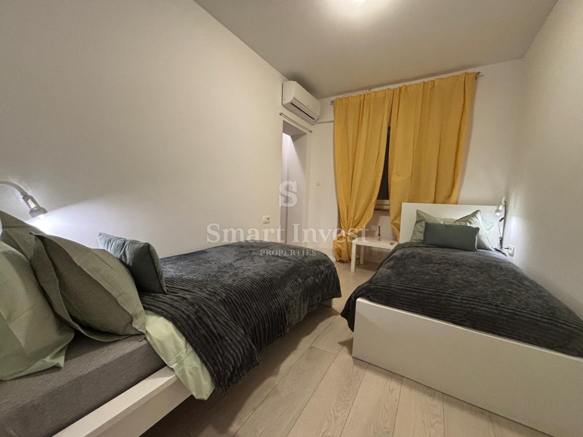 ABBAZIA - CENTRO, appartamento di 2 camere da letto con terrazzo e parcheggio