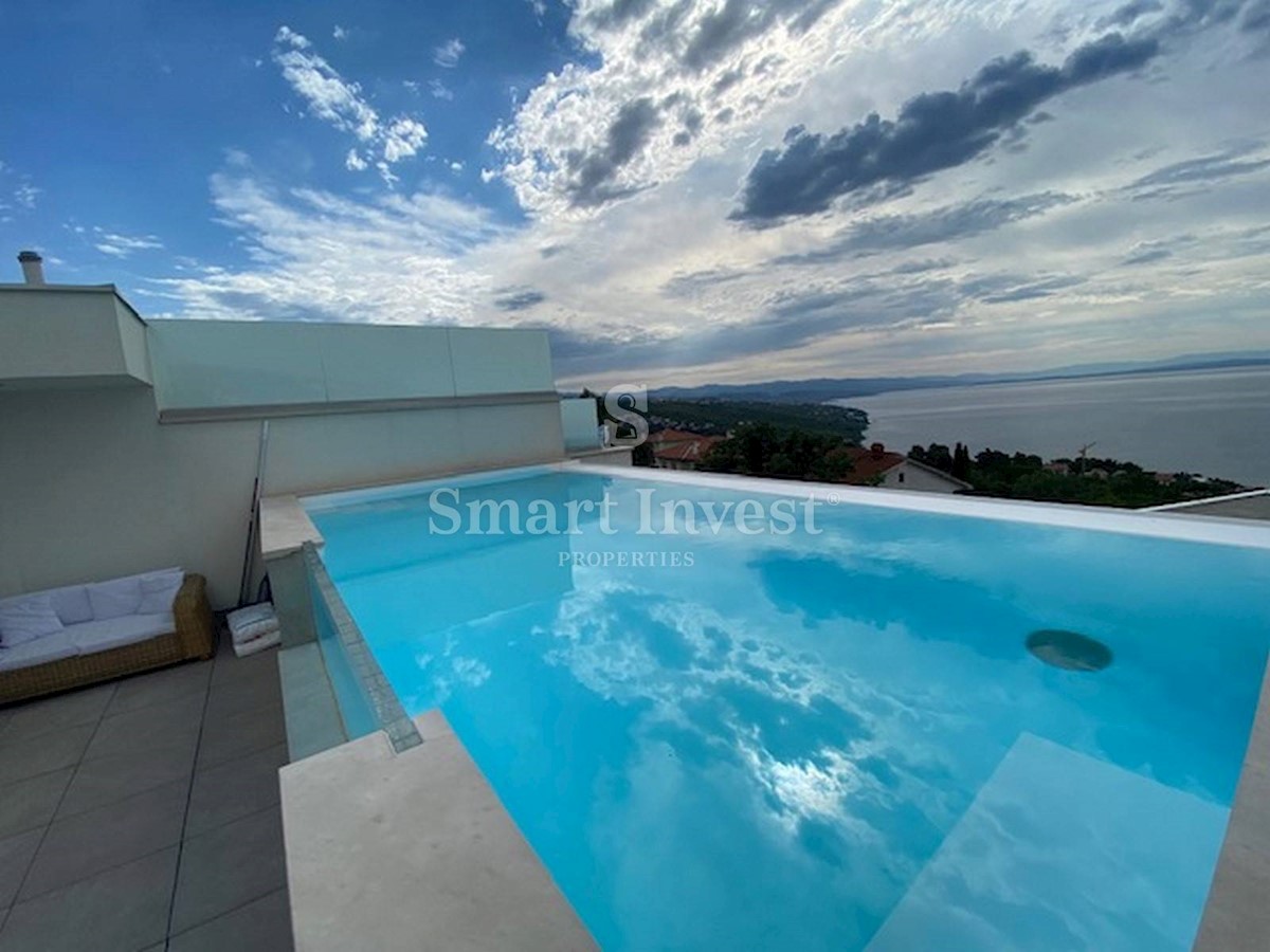 ABBAZIA - POBRI, Villa bifamiliare con piscina e vista mare