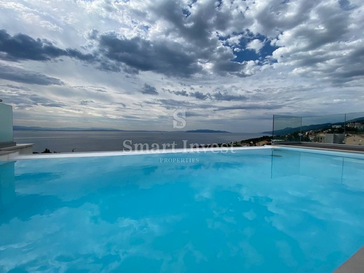 ABBAZIA - POBRI, Villa bifamiliare con piscina e vista mare