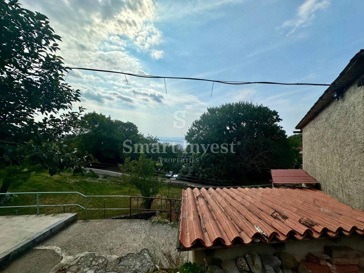 ABBAZIA - POBRI, terreno edificabile con vista parziale sul mare