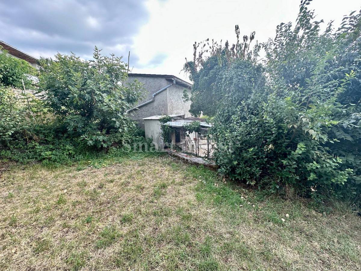 ABBAZIA - POBRI, terreno edificabile con vista parziale sul mare