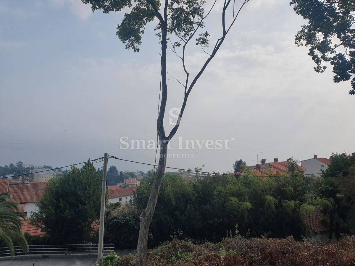 ABBAZIA, terreno con permesso di locazione per 3 appartamenti con vista mare