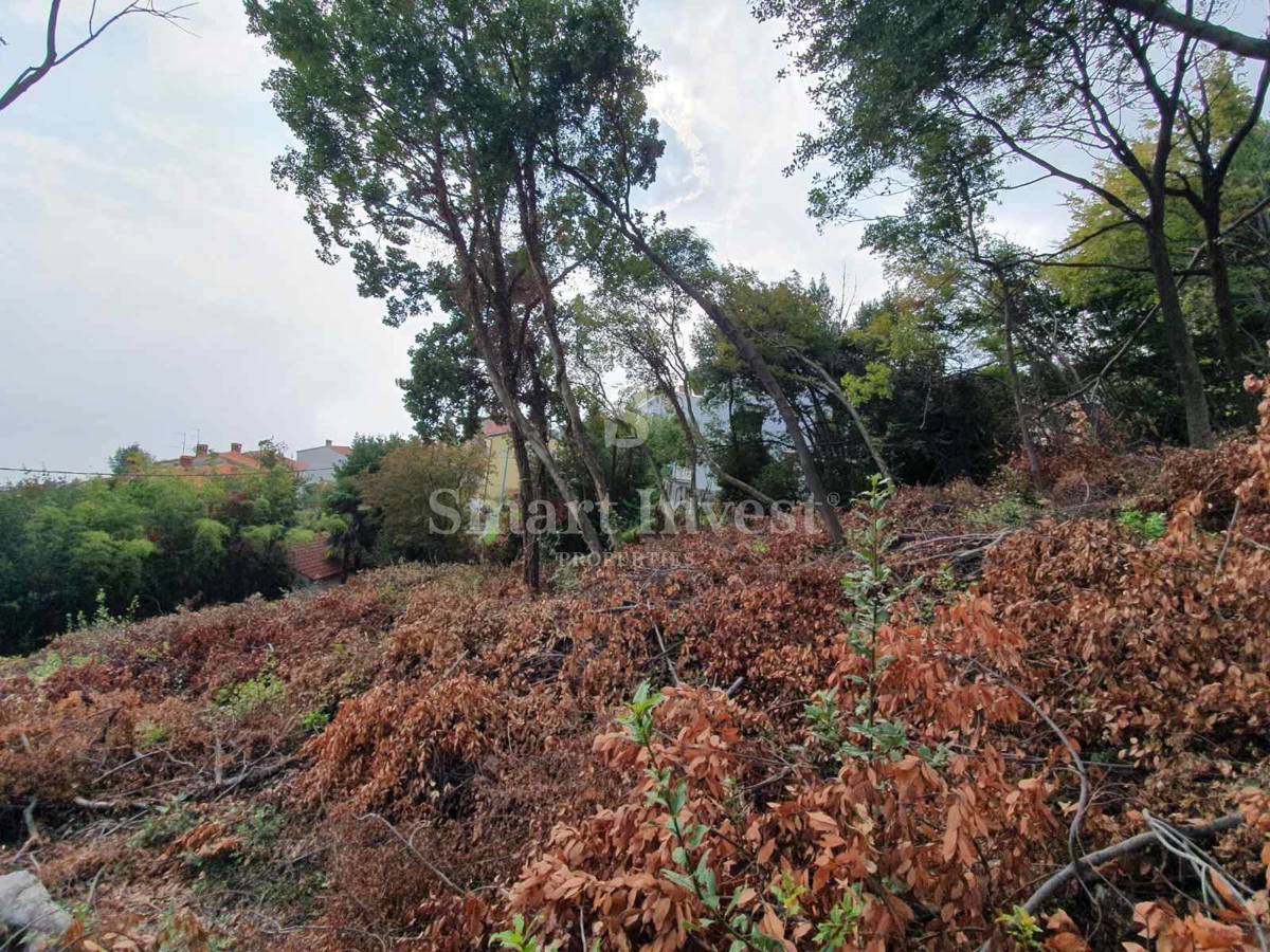 ABBAZIA, terreno con permesso di locazione per 3 appartamenti con vista mare