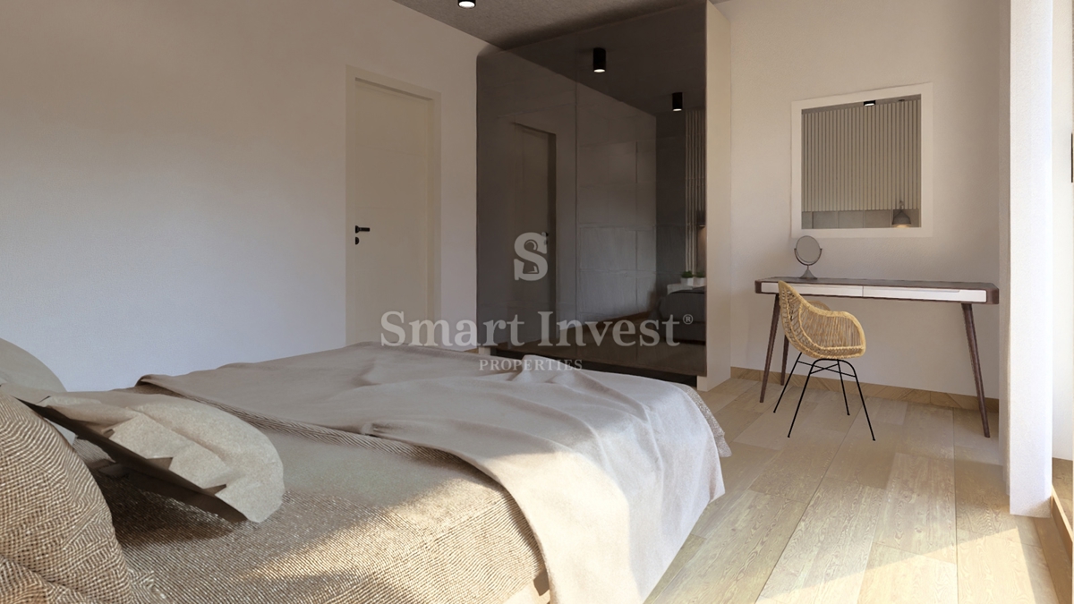 IČIĆI, appartamento trilocale con giardino e vista mare in un nuovo edificio con garage