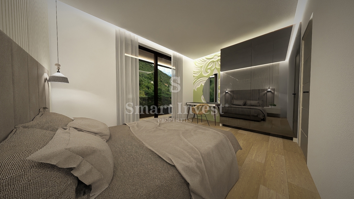 IČIĆI, appartamento trilocale con giardino e vista mare in un nuovo edificio con garage