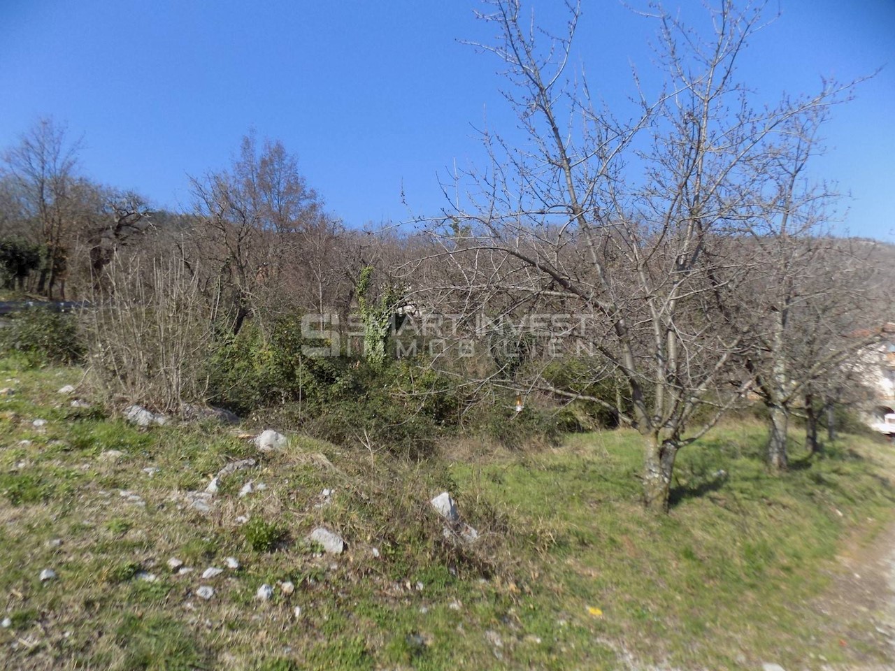 LOVRAN, Terreno edificabile di 1.268 m2 con vista mare, in vendita