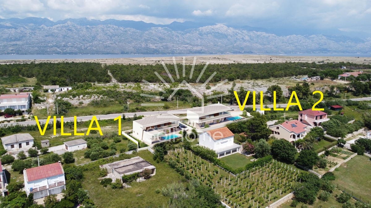 Attraente terreno edificabile con vista sul mare, progetto e permesso di costruzione nella contea di Zara.