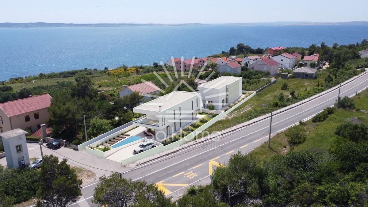 Attraente terreno edificabile con vista sul mare, progetto e permesso di costruzione nella contea di Zara.