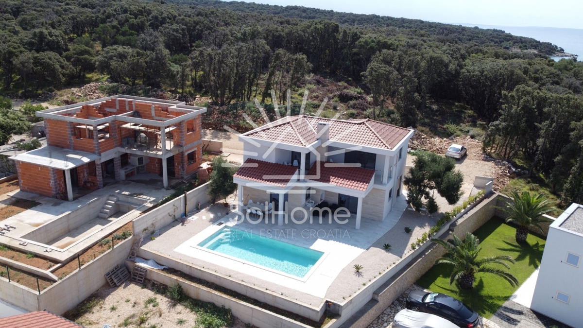 Casa al primo rigo vicino al mare vicino a Novalja