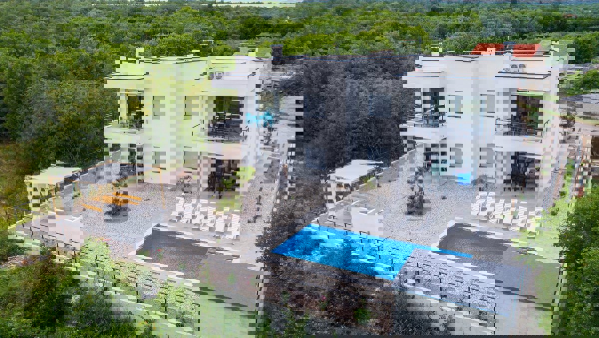 Krk, dintorni, una villa dal design moderno con 4 unità abitative e una bellissima vista sul mare