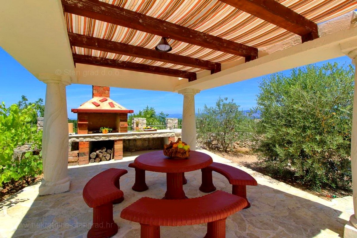 Soline Bay, un'eccezionale villa in pietra mediterranea con piscina e una bellissima vista