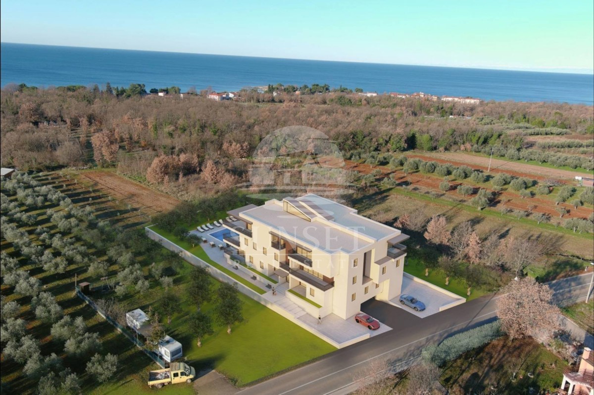 UMAGO – APPARTAMENTO IN EDIFICIO MODERNO AL SECONDO PIANO CON VISTA MARE