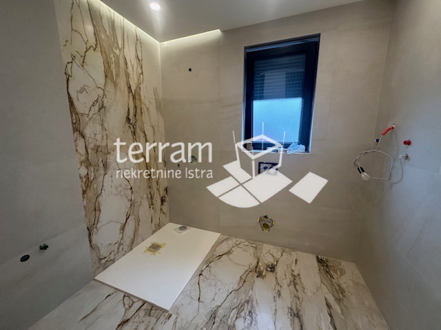 Istria, Pola, Štinjan, appartamento 66,23m2, piano terra, 1 camera da letto + soggiorno con angolo cottura, giardino 100m2, NUOVO, #vendita