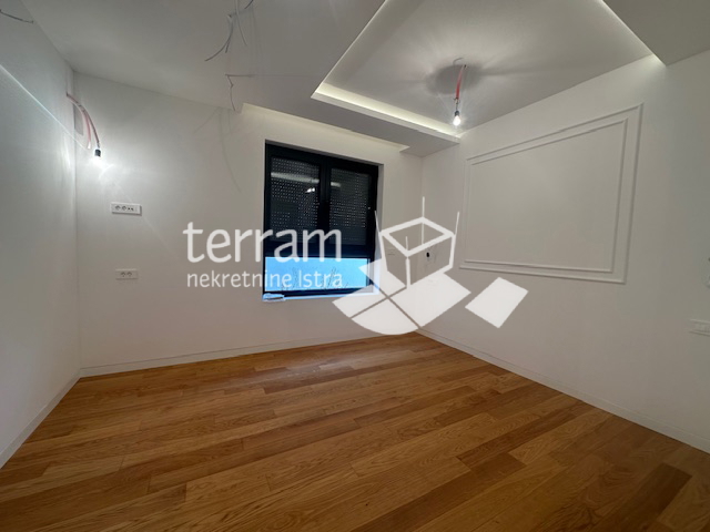 Istria, Pola, Štinjan, appartamento 66,23m2, piano terra, 1 camera da letto + soggiorno con angolo cottura, giardino 100m2, NUOVO, #vendita