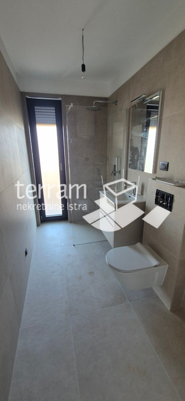 Istra, Pula, Valdebek, piano terra 70,47 m², 2 camere da letto + soggiorno con angolo cottura, giardino 109 m², ripostiglio, parcheggio, NUOVO, #vendita
