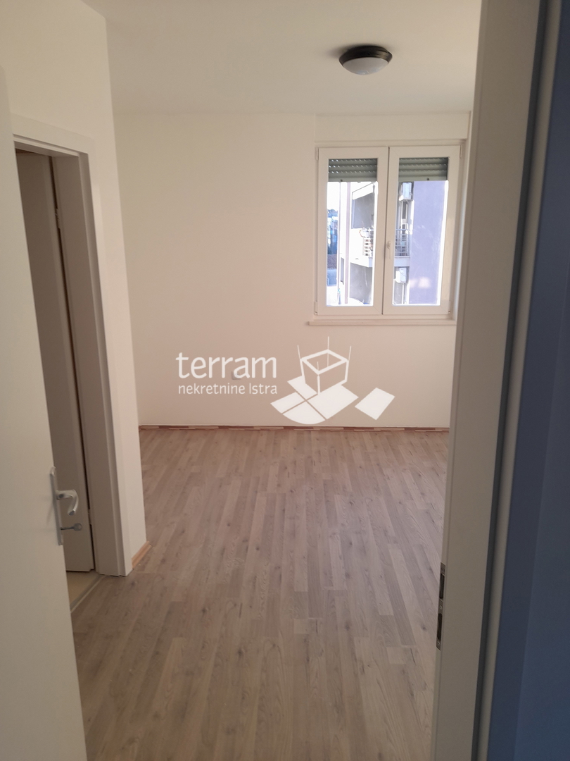 Istra, Pula, Centar, appartamento 88,07m2, 2 camere da letto + soggiorno con angolo cottura, primo piano, ascensore, garage, #vendita