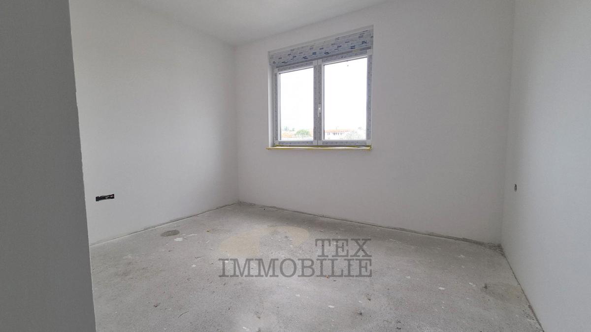 Zona di Parenzo – Attico in nuova costruzione con tre camere da letto