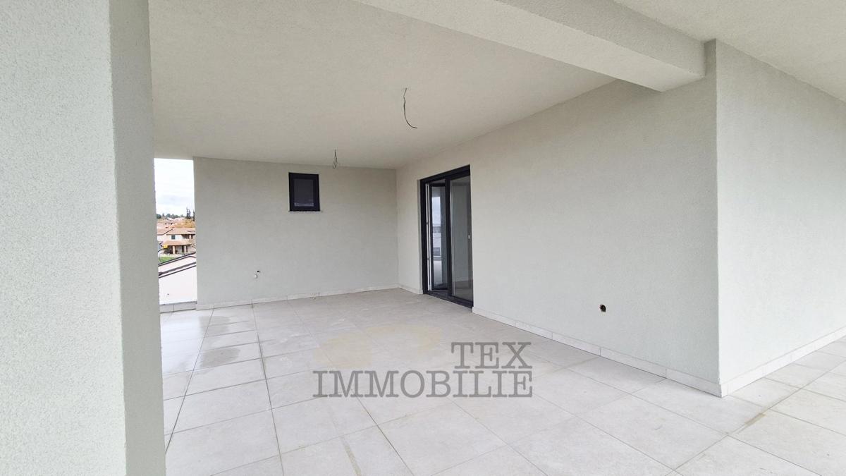 Zona di Parenzo – Attico in nuova costruzione con tre camere da letto