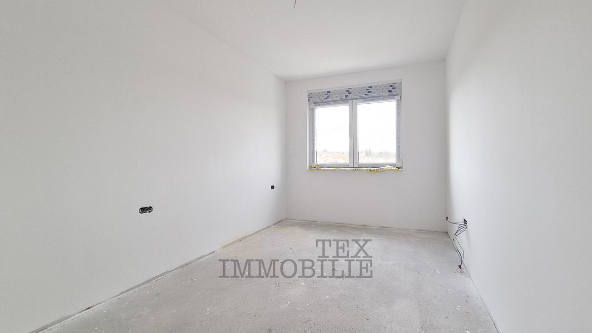 Zona di Parenzo – Attico in nuova costruzione con tre camere da letto