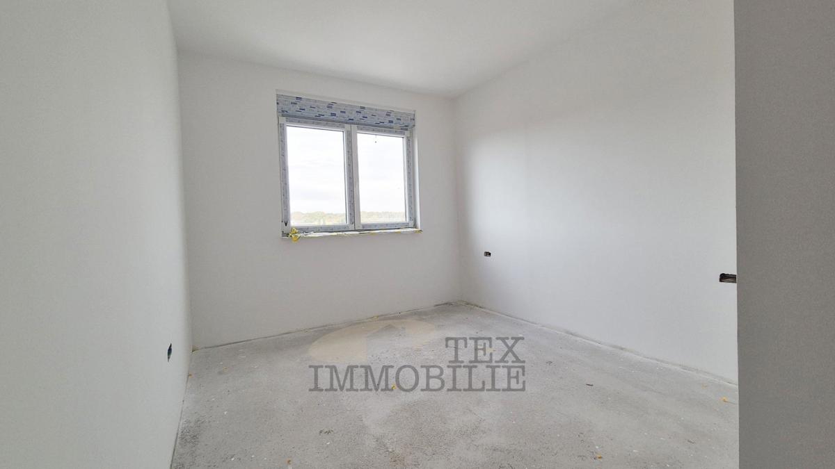 Zona di Parenzo – Attico in nuova costruzione con tre camere da letto