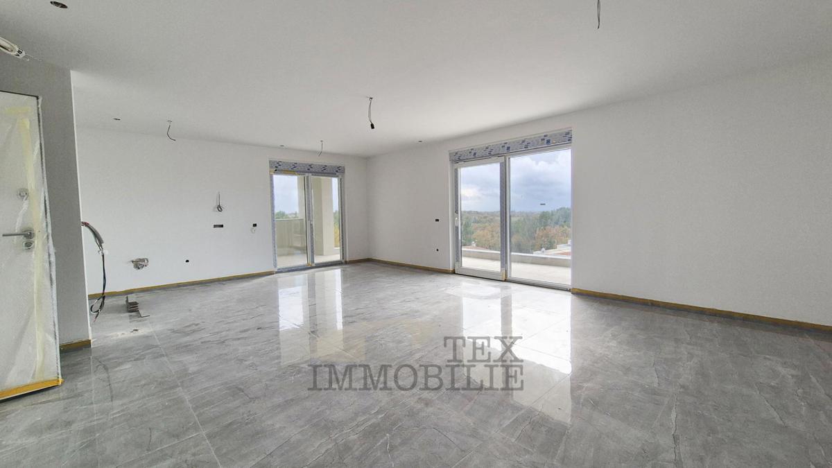 Zona di Parenzo – Attico in nuova costruzione con tre camere da letto