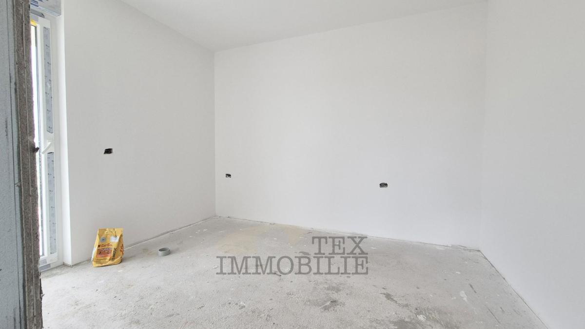 Zona di Parenzo – Attico in nuova costruzione con tre camere da letto