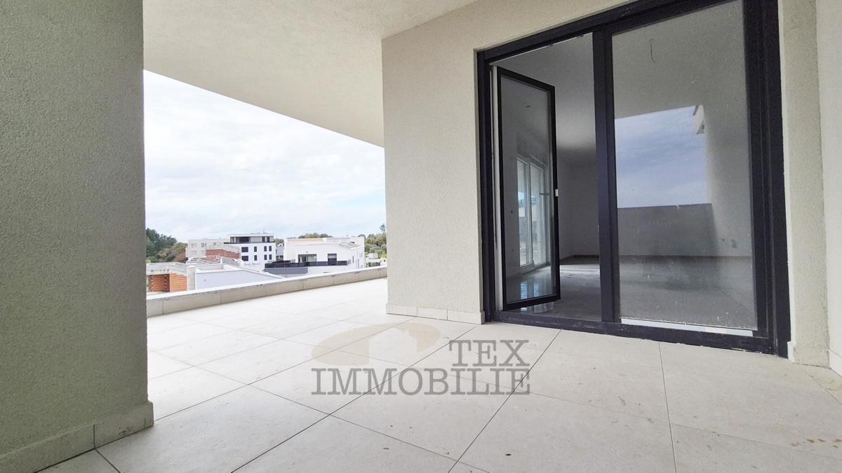 Zona di Parenzo – Attico in nuova costruzione con tre camere da letto