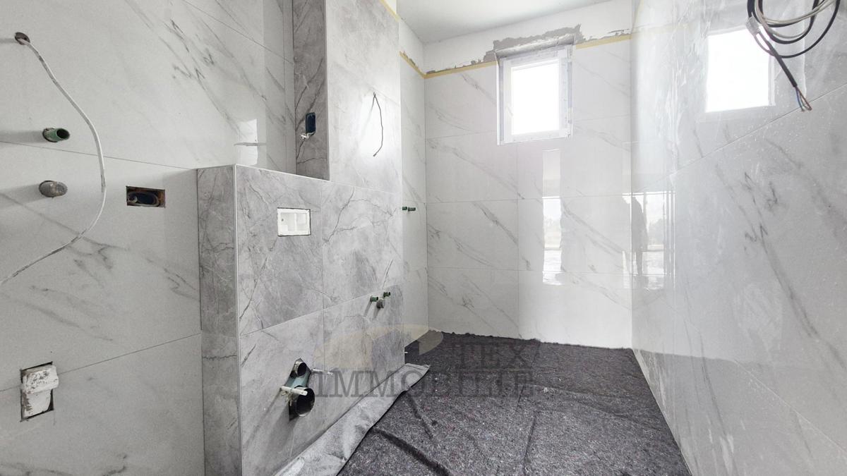 Zona di Parenzo – Attico in nuova costruzione con tre camere da letto