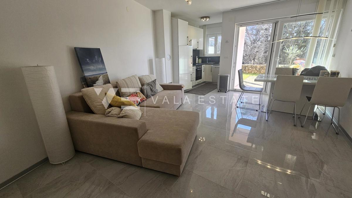 APPARTAMENTO AL PIANO TERRA CON GIARDINO E VISTA MARE