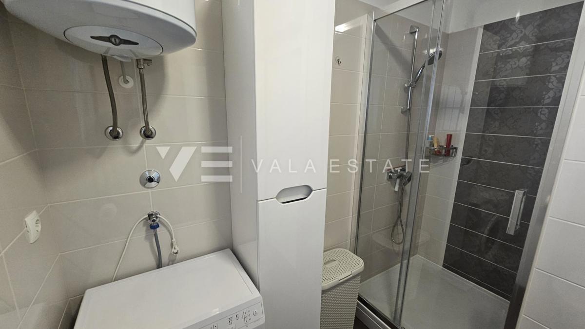 APPARTAMENTO AL PIANO TERRA CON GIARDINO E VISTA MARE