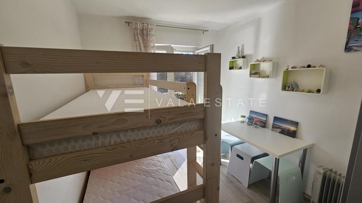 APPARTAMENTO AL PIANO TERRA CON GIARDINO E VISTA MARE