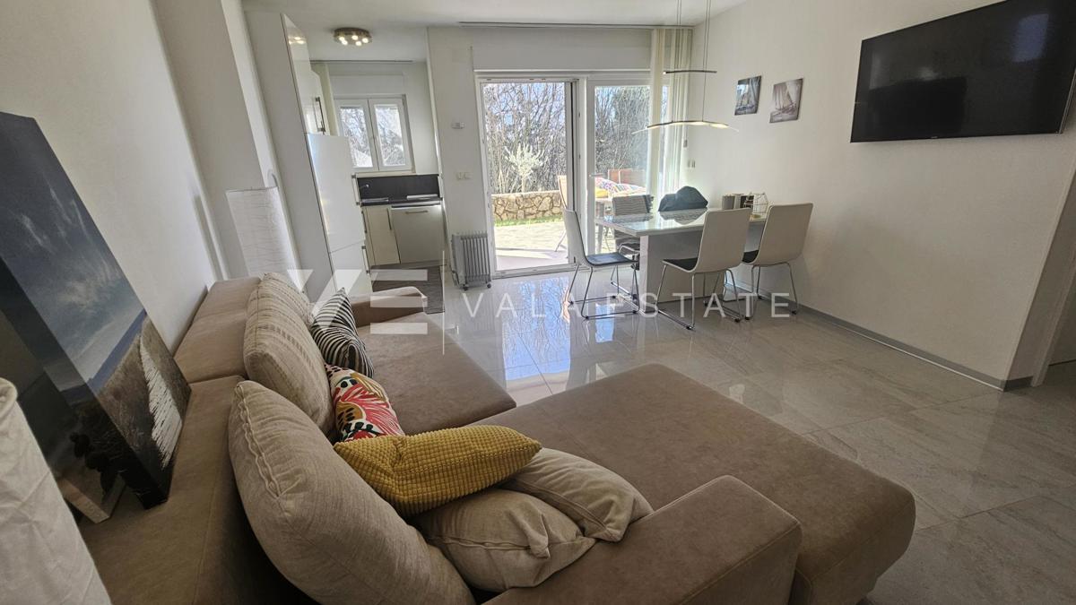 APPARTAMENTO AL PIANO TERRA CON GIARDINO E VISTA MARE