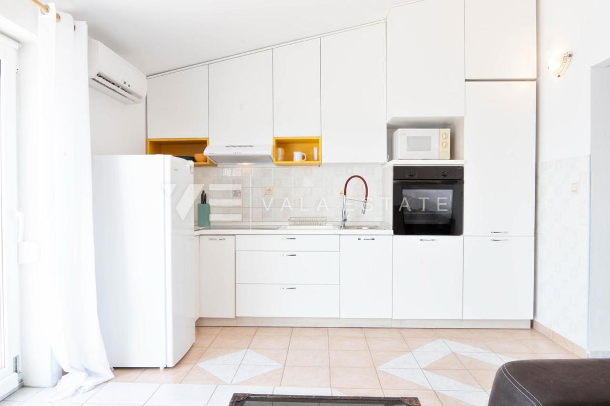 APPARTAMENTO ATTRAENTE CON VISTA MARE APERTO