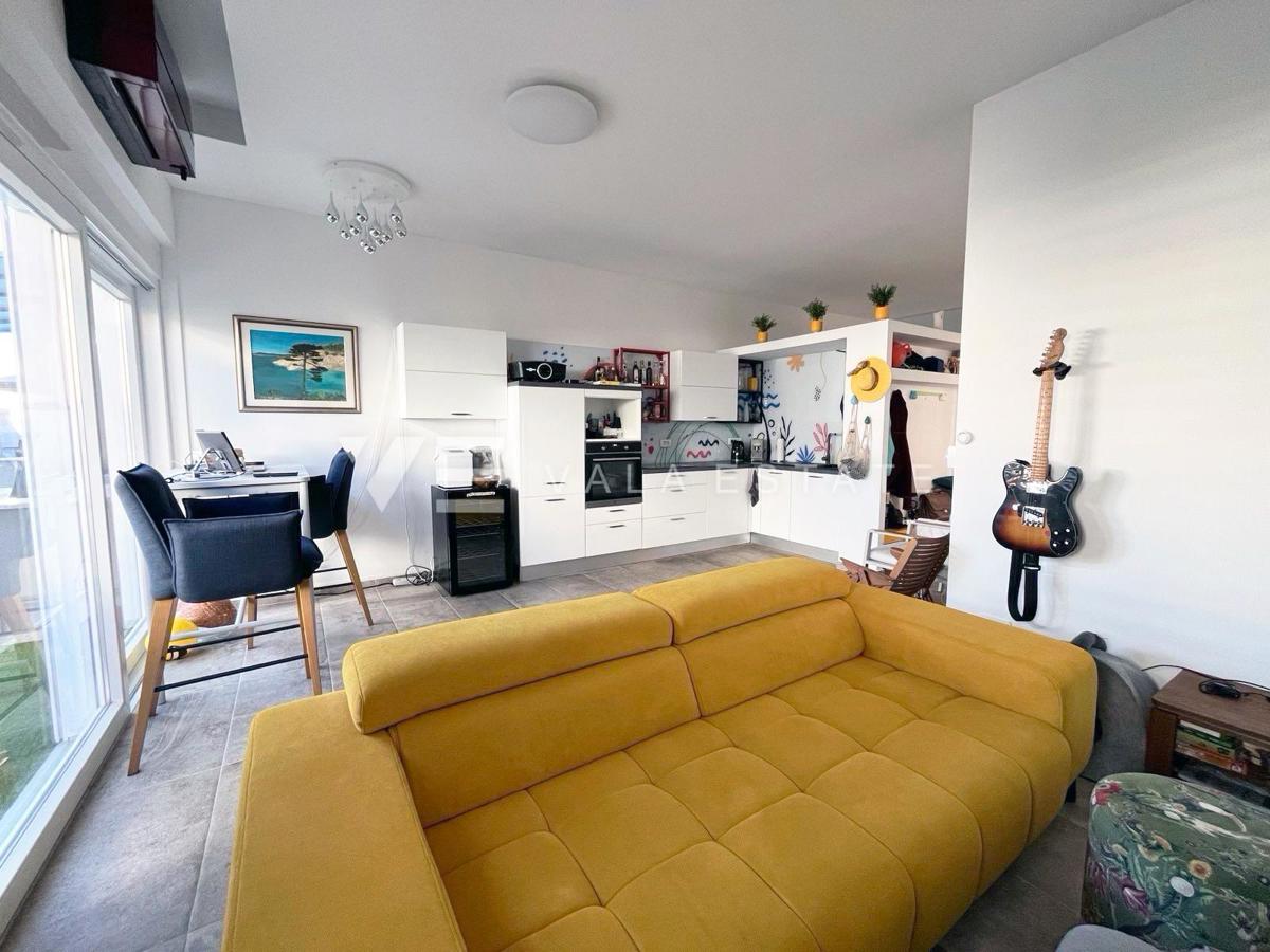 Moderno appartamento al piano terra con giardino in una zona tranquilla.