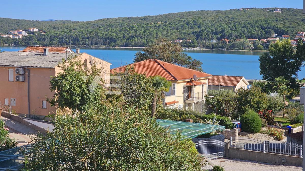 APPARTAMENTO AL PIANO TERRA CON GIARDINO E VISTA MARE