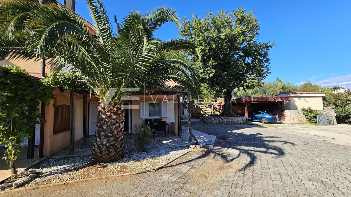 APPARTAMENTO AL PIANO TERRA CON GIARDINO E VISTA MARE