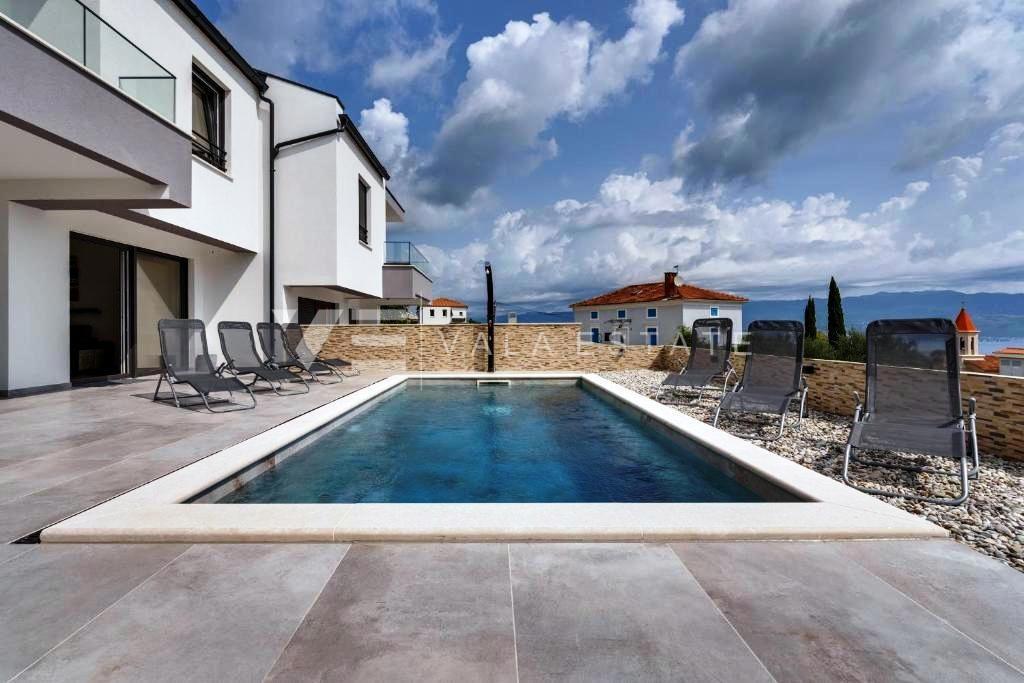 NUOVA CASA BIFAMILIARE CON PISCINA E VISTA MARE