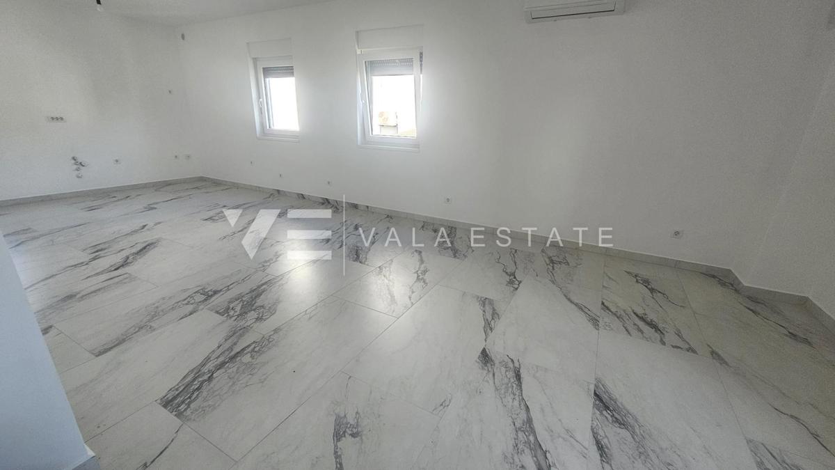 BILOCALE AL PRIMO PIANO DI NUOVA COSTRUZIONE