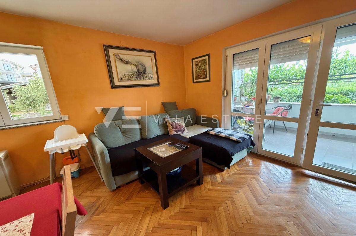 APPARTAMENTO AL PIANO TERRA CON GIARDINO IN POSIZIONE TRANQUILLA