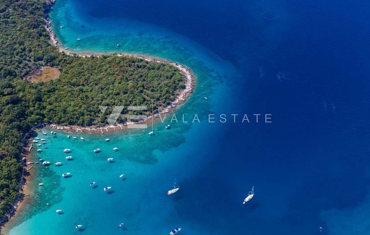 TERRENO EDIFICABILE CON PERMESSO DI COSTRUZIONE PER LA REALIZZAZIONE DI UN EDIFICIO PLURIFAMILIARE CON QUATTRO APPARTAMENTI