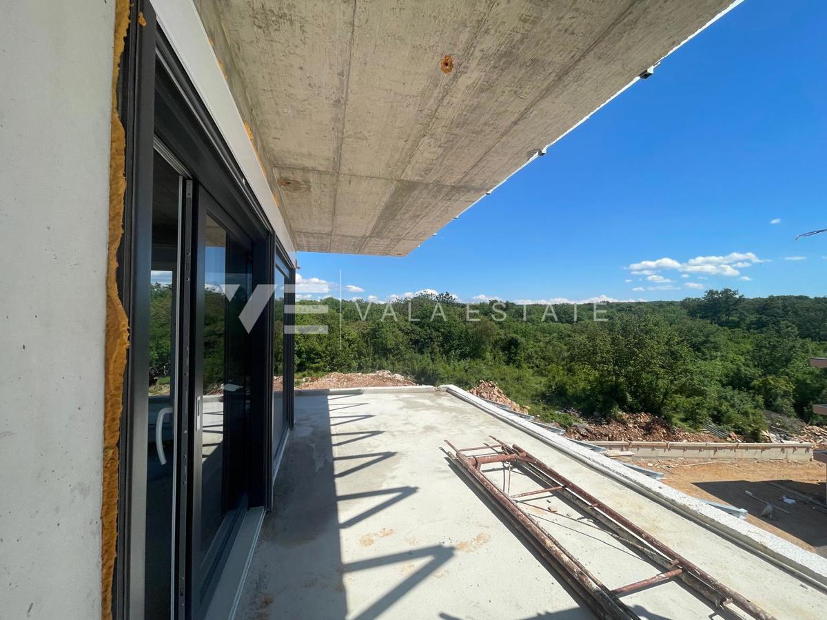 APPARTAMENTO CON DUE CAMERE DA LETTO IN UN NUOVO EDIFICIO CON VISTA MARE