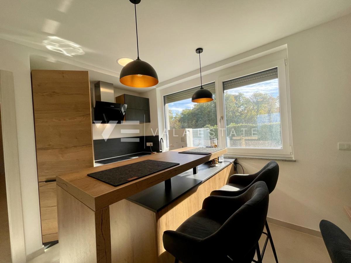 CONFORTEVOLE APPARTAMENTO CON VISTA MARE IN POSIZIONE ATTRAENTE