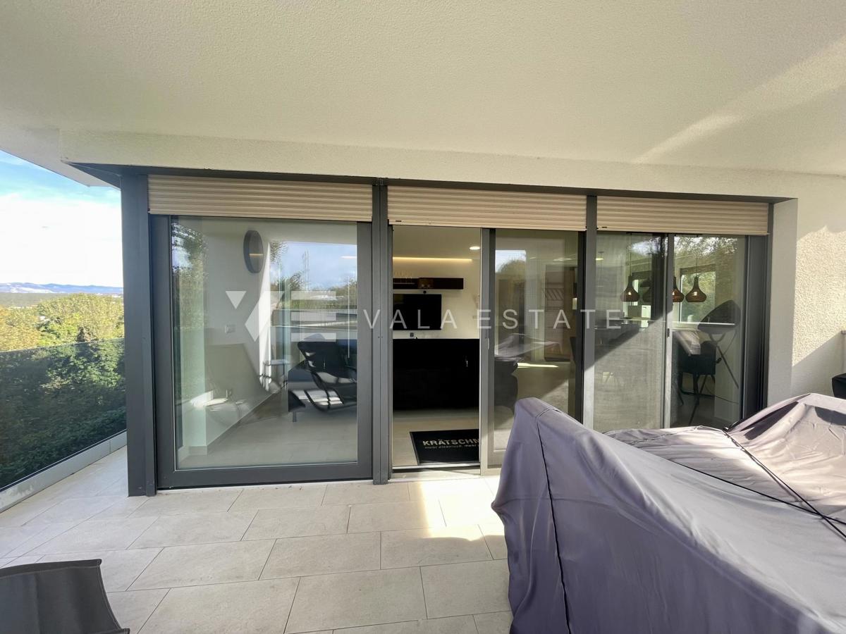 CONFORTEVOLE APPARTAMENTO CON VISTA MARE IN POSIZIONE ATTRAENTE