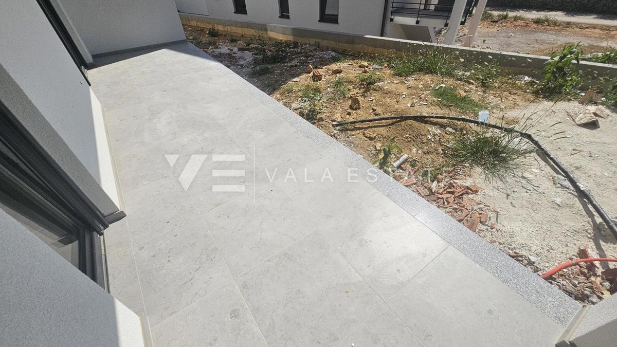 APPARTAMENTO AL PIANO TERRA DI NUOVA COSTRUZIONE CON GIARDINO