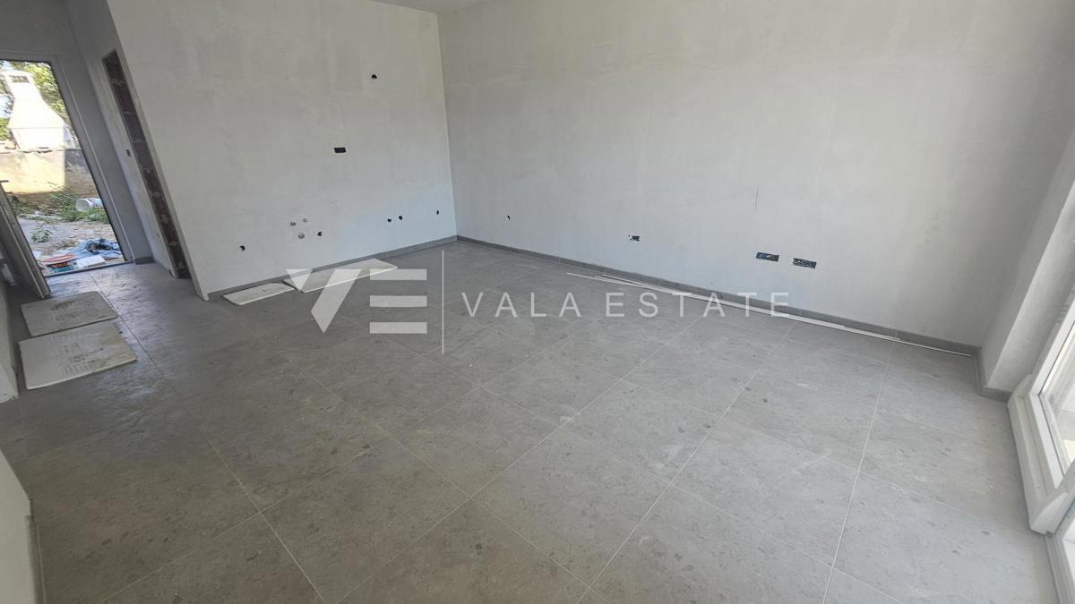 APPARTAMENTO AL PIANO TERRA DI NUOVA COSTRUZIONE CON GIARDINO