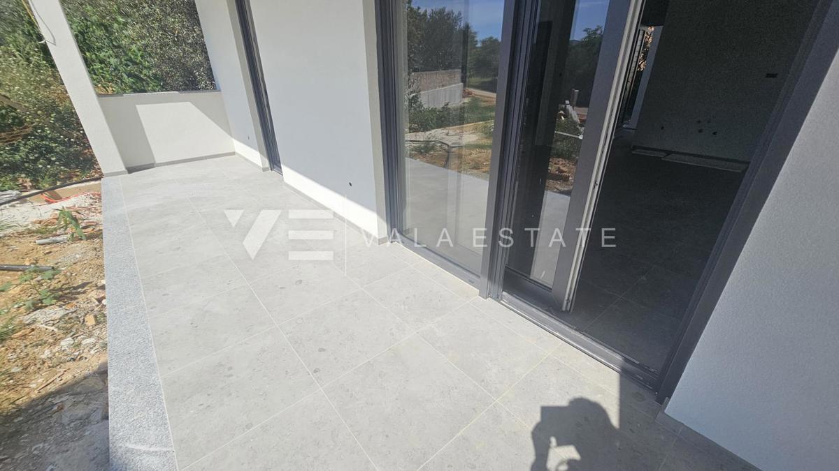 APPARTAMENTO AL PIANO TERRA DI NUOVA COSTRUZIONE CON GIARDINO