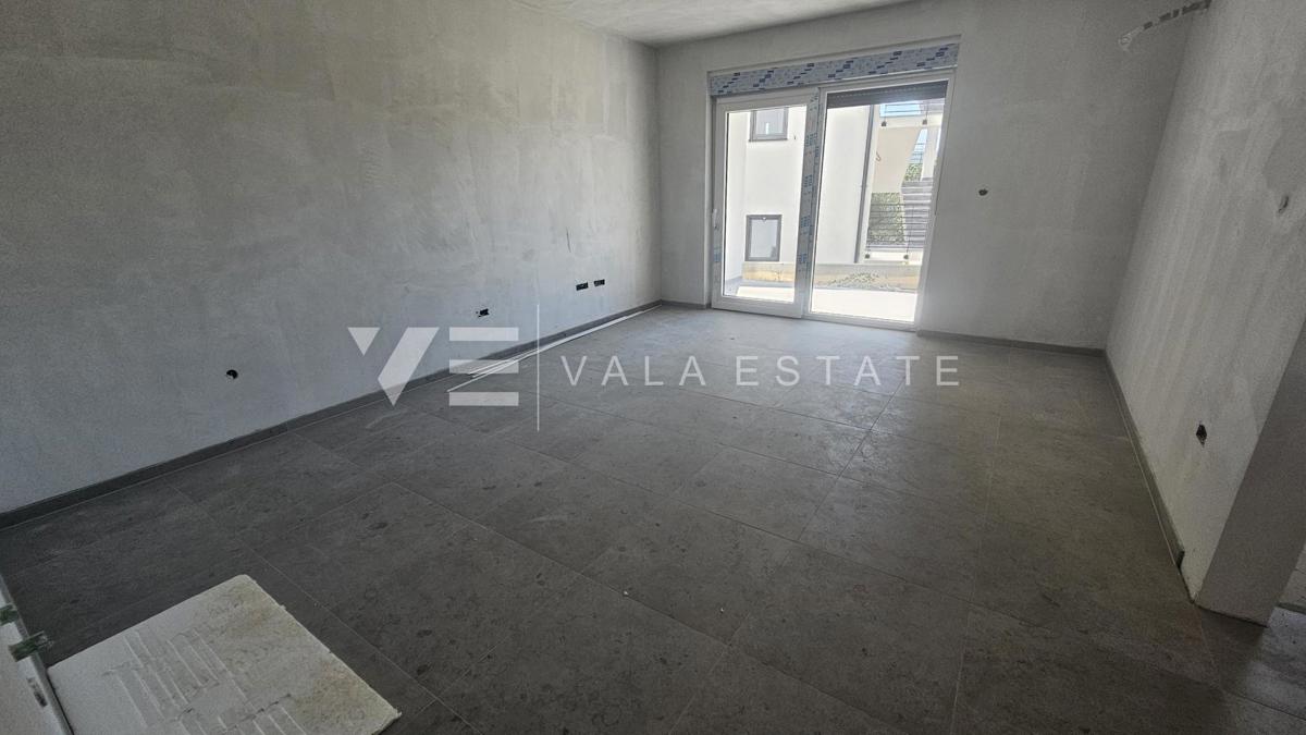 APPARTAMENTO AL PIANO TERRA DI NUOVA COSTRUZIONE CON GIARDINO