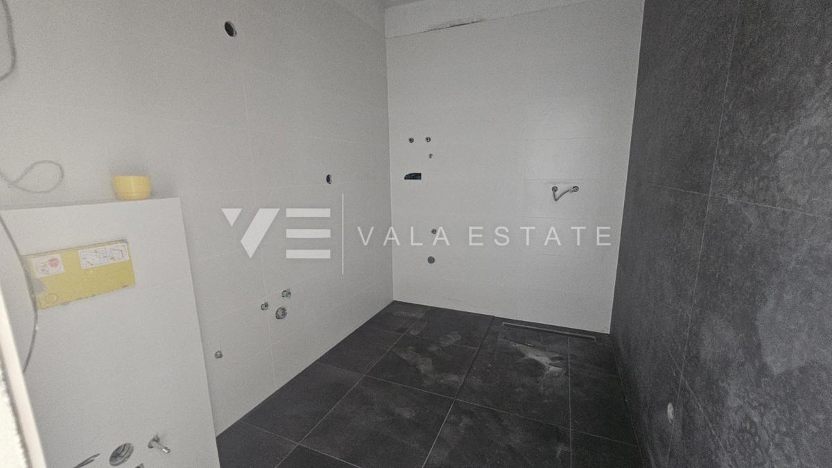 APPARTAMENTO AL PIANO TERRA DI NUOVA COSTRUZIONE CON GIARDINO