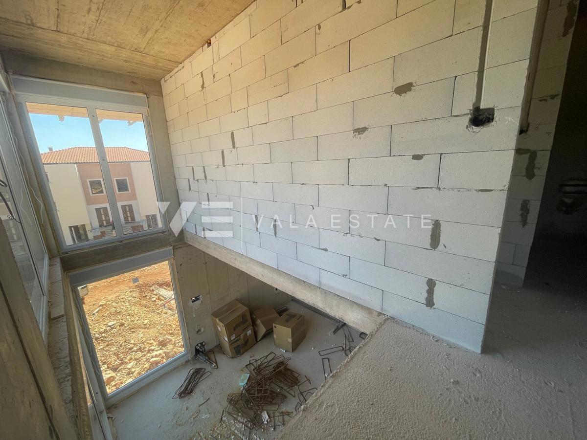 APPARTAMENTO CON DUE CAMERE DA LETTO IN UN NUOVO EDIFICIO CON VISTA MARE
