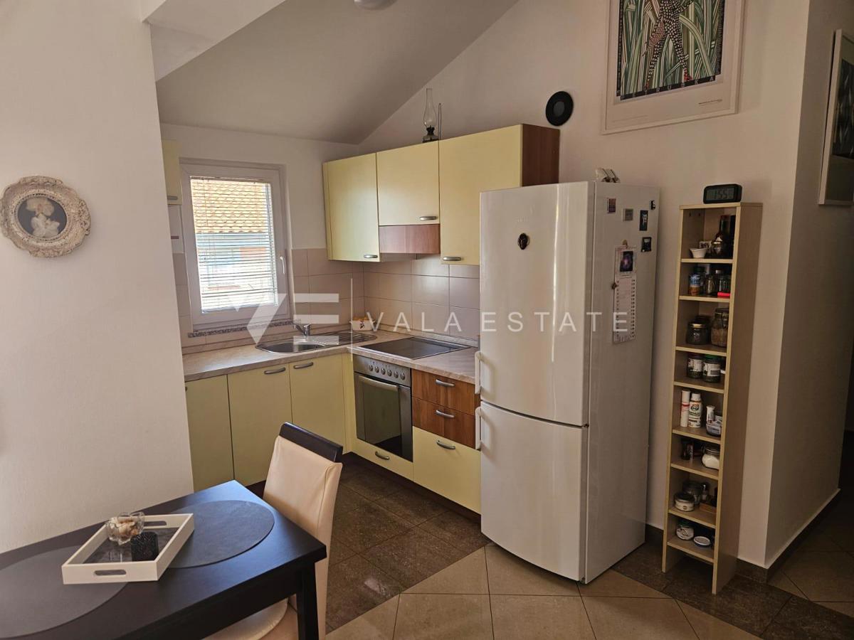 APPARTAMENTO ARREDATO CON GIARDINO IN POSIZIONE TRANQUILLA